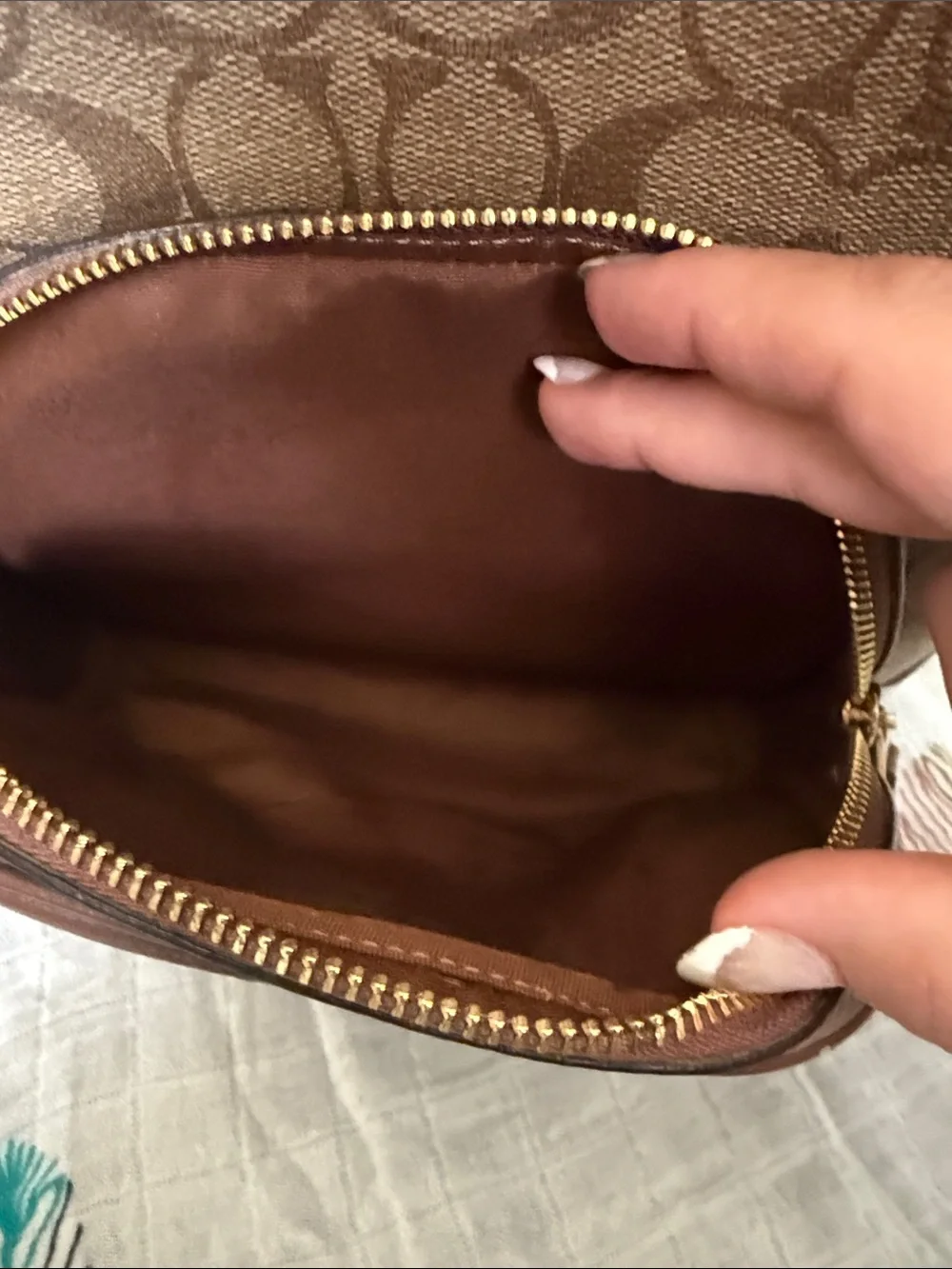 Coach Brown Signature Leather Backpack with gold hardware